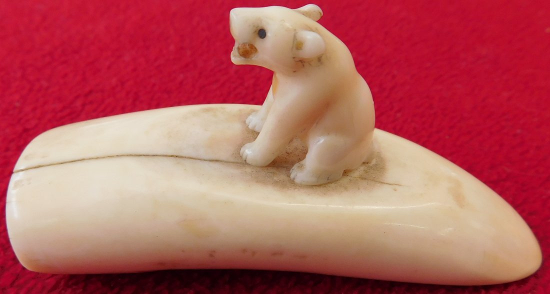 Polar Bear Sculpture w/Stand: Polar Bear Sculpture w/Stand, circa 1900s. Made of bone, the item measures 3" x 2" x 1". Eskimo, Alaska. Hungry polar bear looking for lunch. Condition: Has a crack, see images. Shipping: $18.50 w/ins