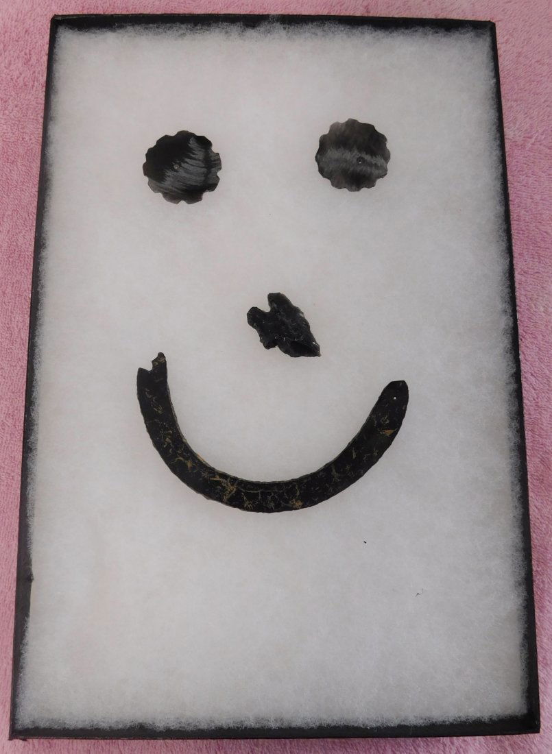 Frame of Pre-Columbian Relics: Frame of Pre-Columbian Relics, pre-historic items. Made of obsidian, the items measure from 1.5" to 4.5" long. Colima, Mexico. Frame not included. Condition: Minor damage on one, see images. Shipping: