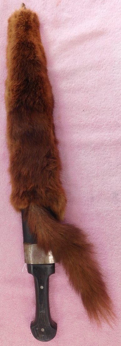 Short Sword: Short Sword, circa WWII. Made of steel, wood, horn and fur, the item measures 25.5" x 4" x 2". Khyber Pass, Afghanistan. Lethal weapon. Condition: Good, see images. Shipping: $30.00 due to length, w/i