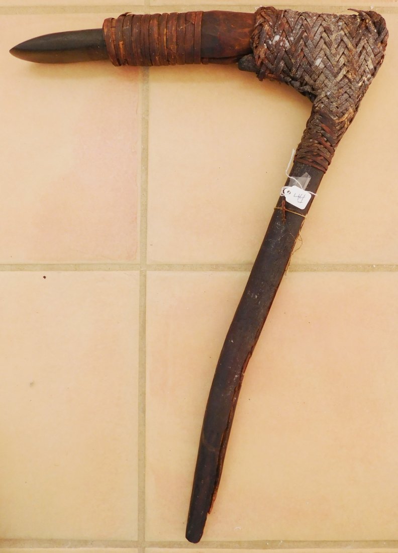 Papua New Guinea Hafted Adze w/Helm COA: Papua New Guinea Hafted Adze, circa WWII. Made of wood, ratan and jade, the item measures 24" x 16" x 1.5". PNG. Collected in WWII, may have been old then. Ex. Maslyn Williams, author of Stone Age Isl