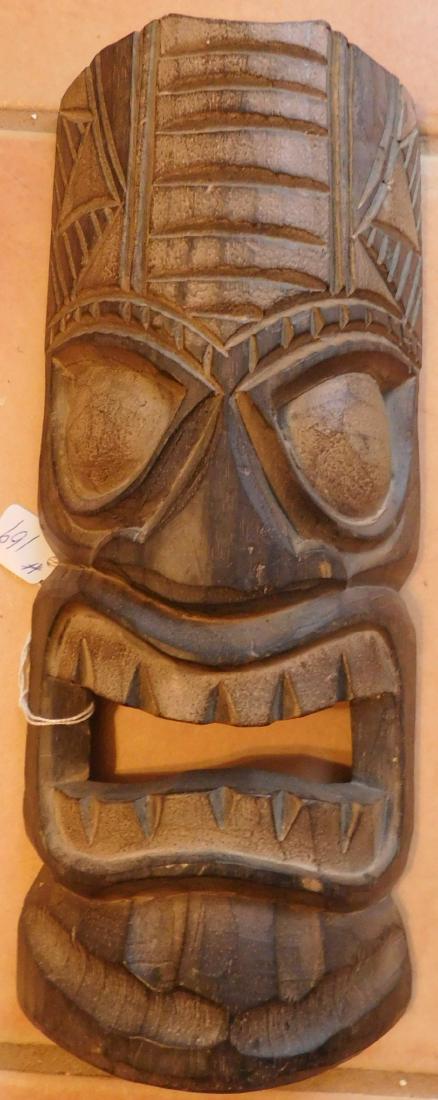 Polynesian Wood Mask: Polynesian Wood Mask, circa 1960s. Made of wood, the item is 5" x 12" x 2.5". Tahiti. Classic tiki-style. Condition: Good, see images. Shipping: $30.00, due to length, w/insurance and signature.