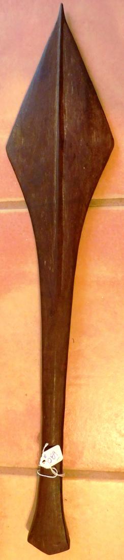 Polynesian War Club Polynesian War Club w/COA: Polynesian War Club, circa WWII. Made of ebony-like hardwood, the item is 24" x 5" x 1". New Britain. Unusual striking surface.Ex. Maslyn Williams, author of Stone Age Island. Helm Certificate of Auth