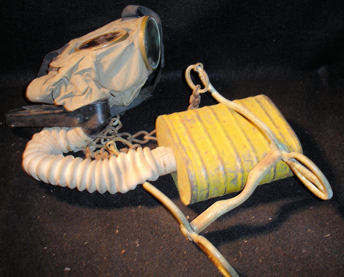US Army Gas Mask w/ Yellow Cannister: old US army gas mask with yellow cannister, with hose mask, bracket