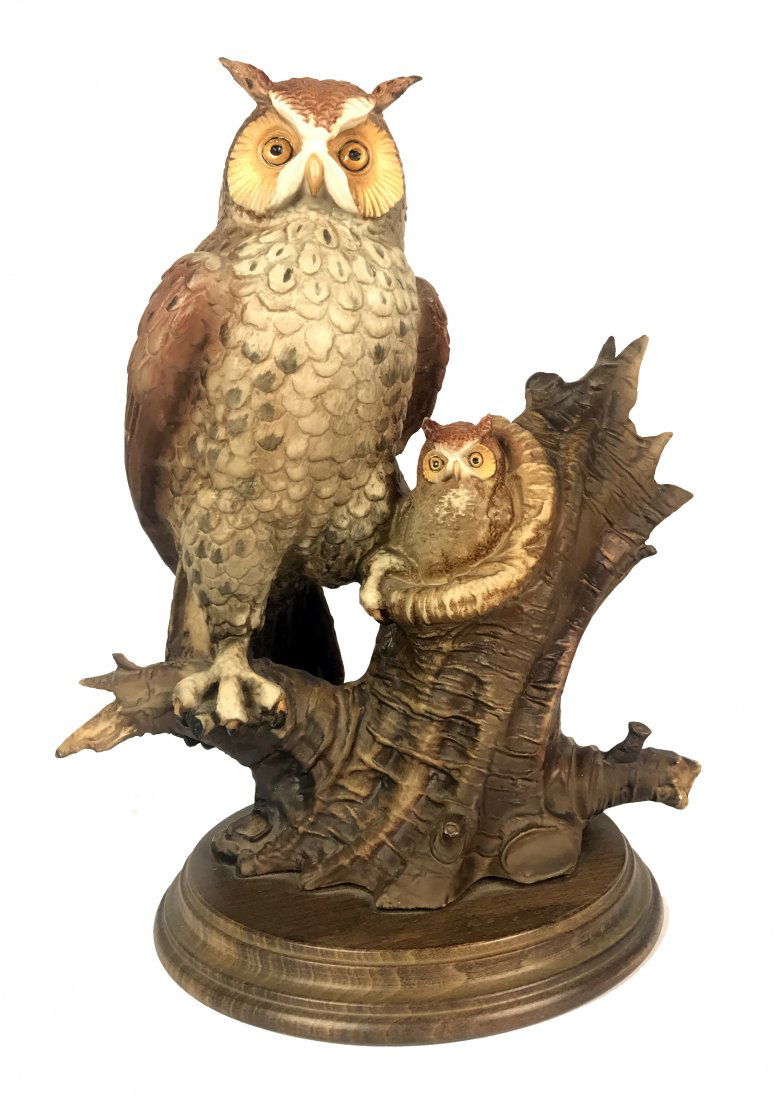 CAPODIMONTE, ITALIAN 20TH CENTURY: Property of A Private Gentleman CAPODIMONTE, ITALIAN 20TH CENTURY "Protector" Modeled as an owl standing next to his nest affixed to a wooden stand 11 1/4 in. (28.57 cm.) high Porcelain Made in Italy,