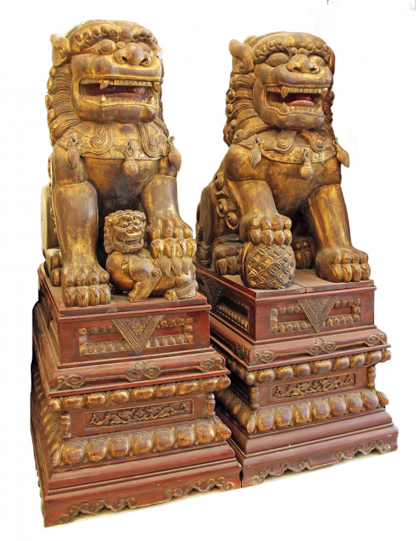 A MASSIVE PAIR OF GILT WOOD FIGURES OF FOO DOGS (1 of 1)
