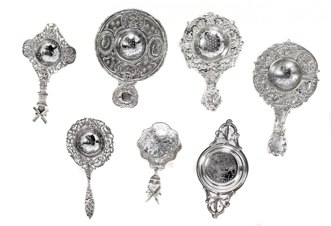 SEVEN VINTAGE SILVER PLATED TEA STRAINERS (1 of 1)