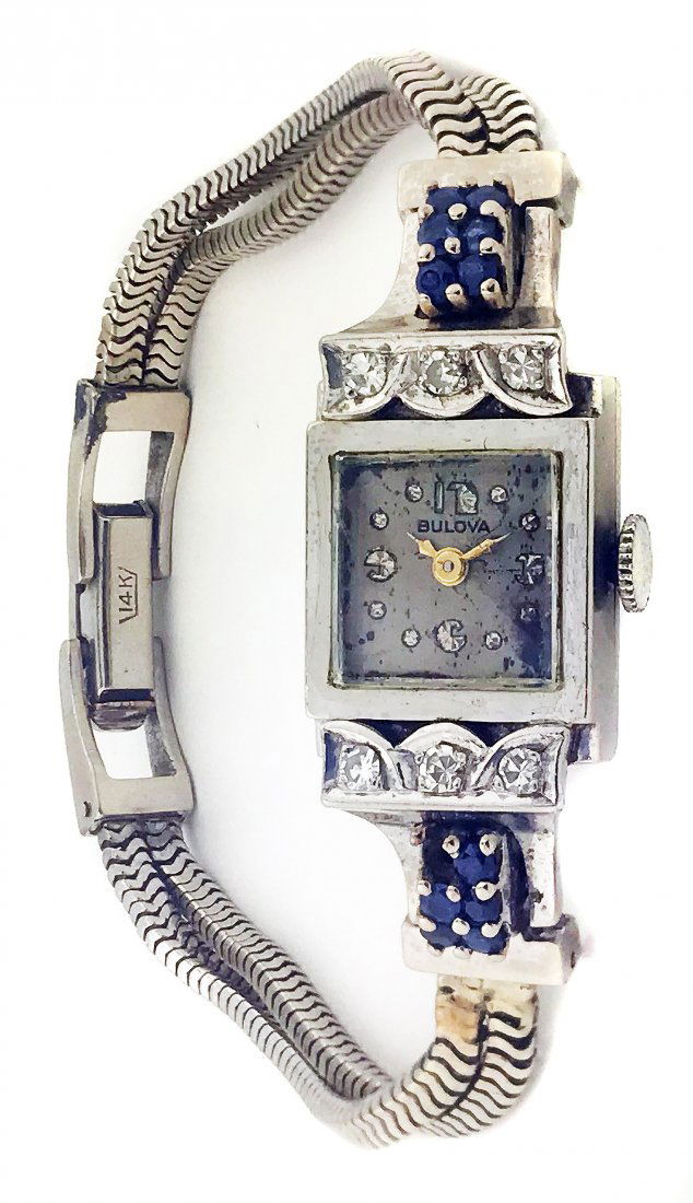 BULOVA, A LADY'S YELLOW GOLD BRACELET WATCH: Property of A Palm Beach LadyBULOVA A LADY'S YELLOW GOLD BRACELET WATCHmanual winding integrated articulated 14k yellow gold bracelet case, dial and clasp signed width 14 mm, length overall approximat