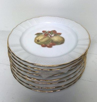 A set of eight Limoges porcelain dessert plates, French: A set of eight Limoges porcelain dessert plates. French, 20th Century. By L. Bernardaud & Cie. Each centered by a vignette of fruit. Diameter 7.5"