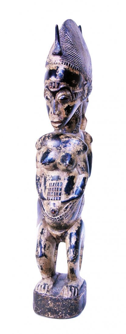 STYLE OF BAULE PEOPLE COTE D’IVOIRE: Property of Lynn University to benefit their Library Renovation Fund To be sold subject to no reserve Style of BAULE PEOPLE COTE D’IVOIRE Diviner's Totem Carved wood with dark brown patina and trace