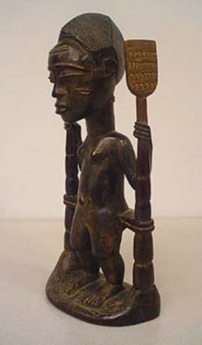 STYLE OF BAULE PEOPLE COTE D’IVOIRE: Property of Lynn University to benefit their Library Renovation Fund To be sold subject to no reserve Style of BAULE PEOPLE COTE D’IVOIRE Initiation Totem Carved wood, with dark brown patina of youn