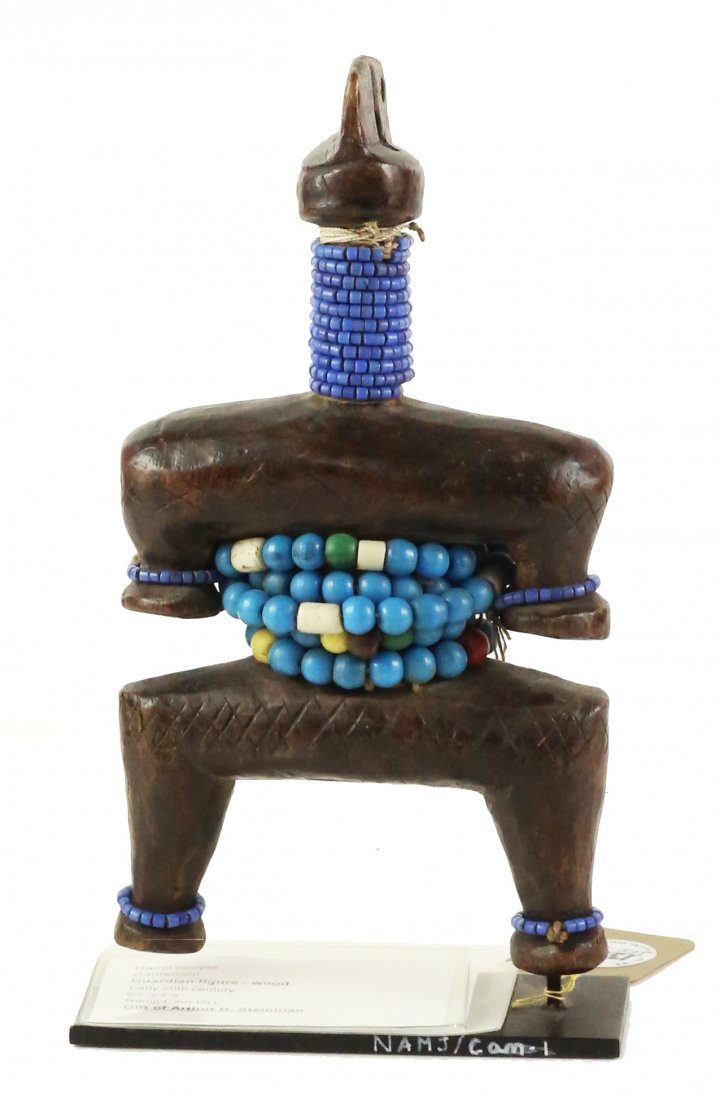 STYLE OF GUARDIAN FIGURE - WOOD (1 of 3)