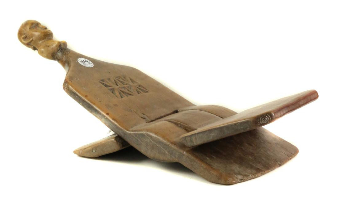 STYLE OF CEREMONIAL CHILD'S BED - CARVED WOOD (1 of 2)