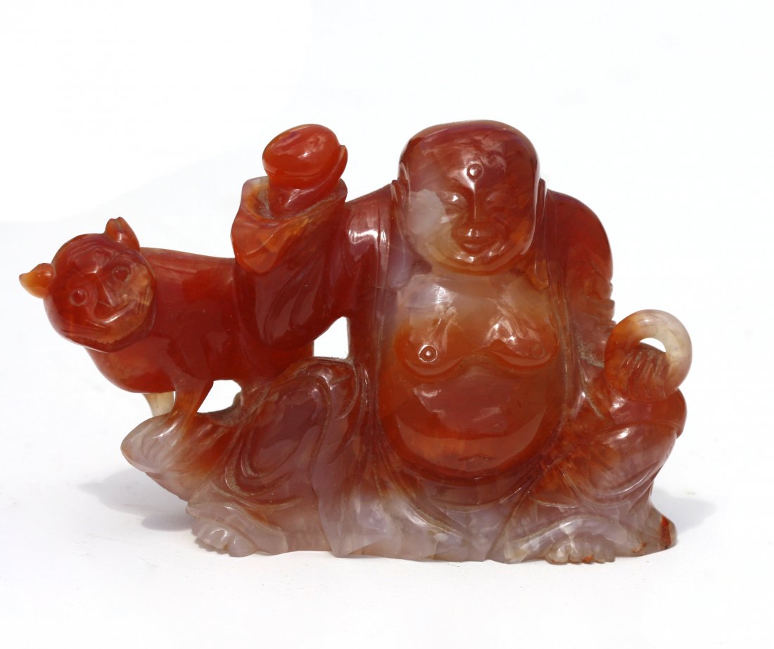 A Chinese Carved Carnelian Agate Figure of Budai (1 of 5)