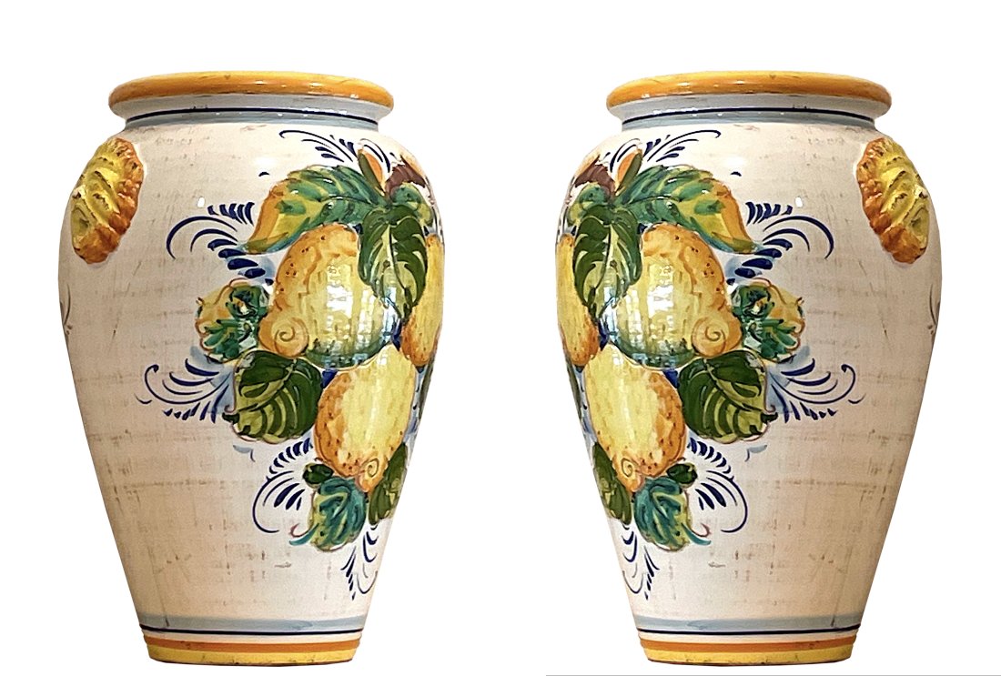Two Italian Majolica Jars: Two Italian Majolica Lemon Decorated Jars Each tapered vessel decorated with lemons. Height 28 in. (71.12 cm.) (approx)