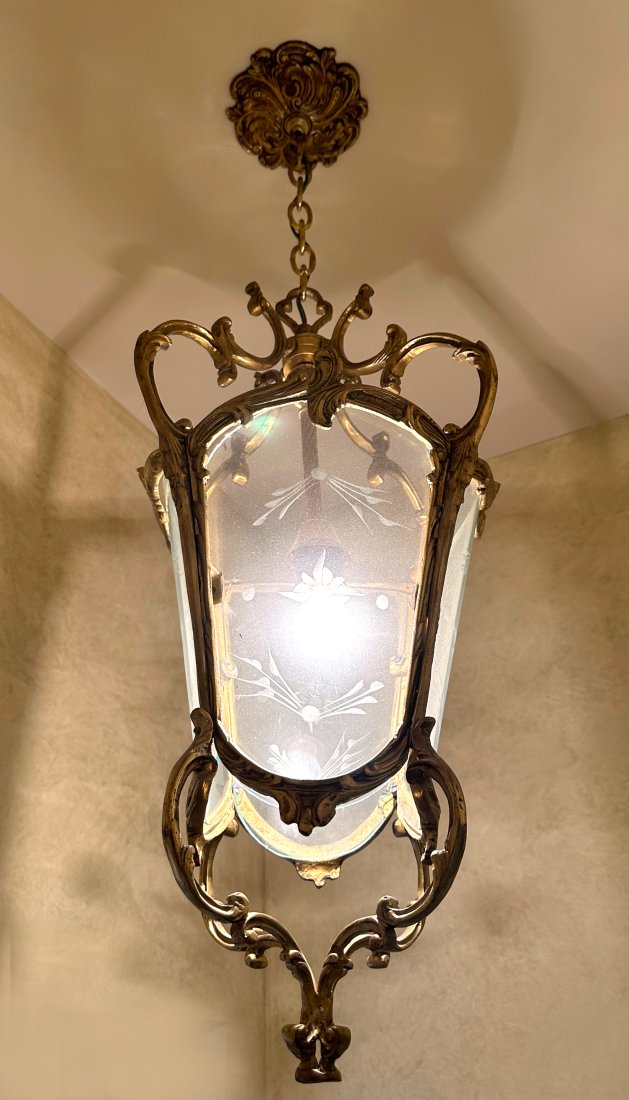 Rococo Style Bronze and Etched Glass Lantern: Rococo Style Bronze and Etched Glass Lantern The foliate cast bronze frame fitted with four frosted glass panels etched with foliage. Height 39 in. (99.06 cm.) (approx), Width 14 in. (35.56 cm.) (appr