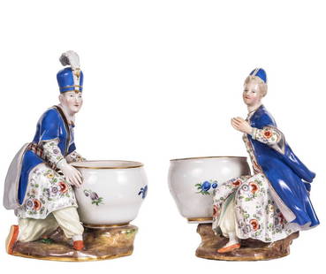 Pair of Meissen Porcelain Figural Bowls: Pair of Meissen Porcelain Figural Bowls. German, second half 19th Century, the underside with crossed swords in underglaze blue. Modeled as a male and female Turk, with blue frocks and foliate decorat
