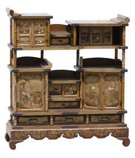 Japanese Gilt Lacquer Tiered Cabinet: Japanese Gilt Lacquer Tiered Cabinet Early 20th Century. The multi-tiered rectangular cabinet with numerous doors and slides, decorated with applied mother-of-pearl, with tones of lacquer in red, brow