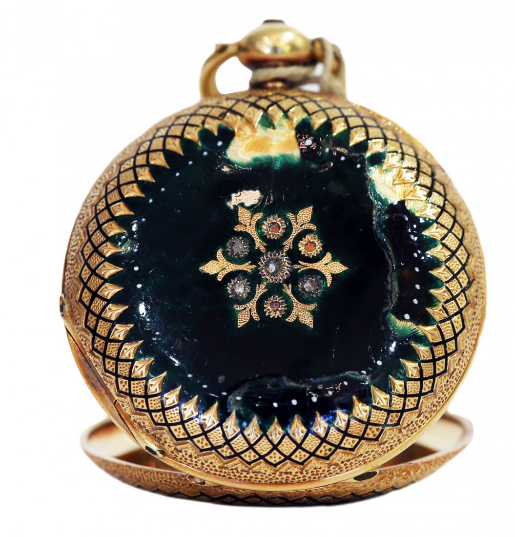 EIGHTEEN KARAT YELLOW GOLD AND ENAMEL POCKET WATCH: AN EIGHTEEN KARAT YELLOW GOLD AND ENAMEL POCKET WATCH. A ladies’ gold pocket watch with T.R. Losada signed movement, with a with a white enamel dial and a second hand sub dial, in hunter’s case in