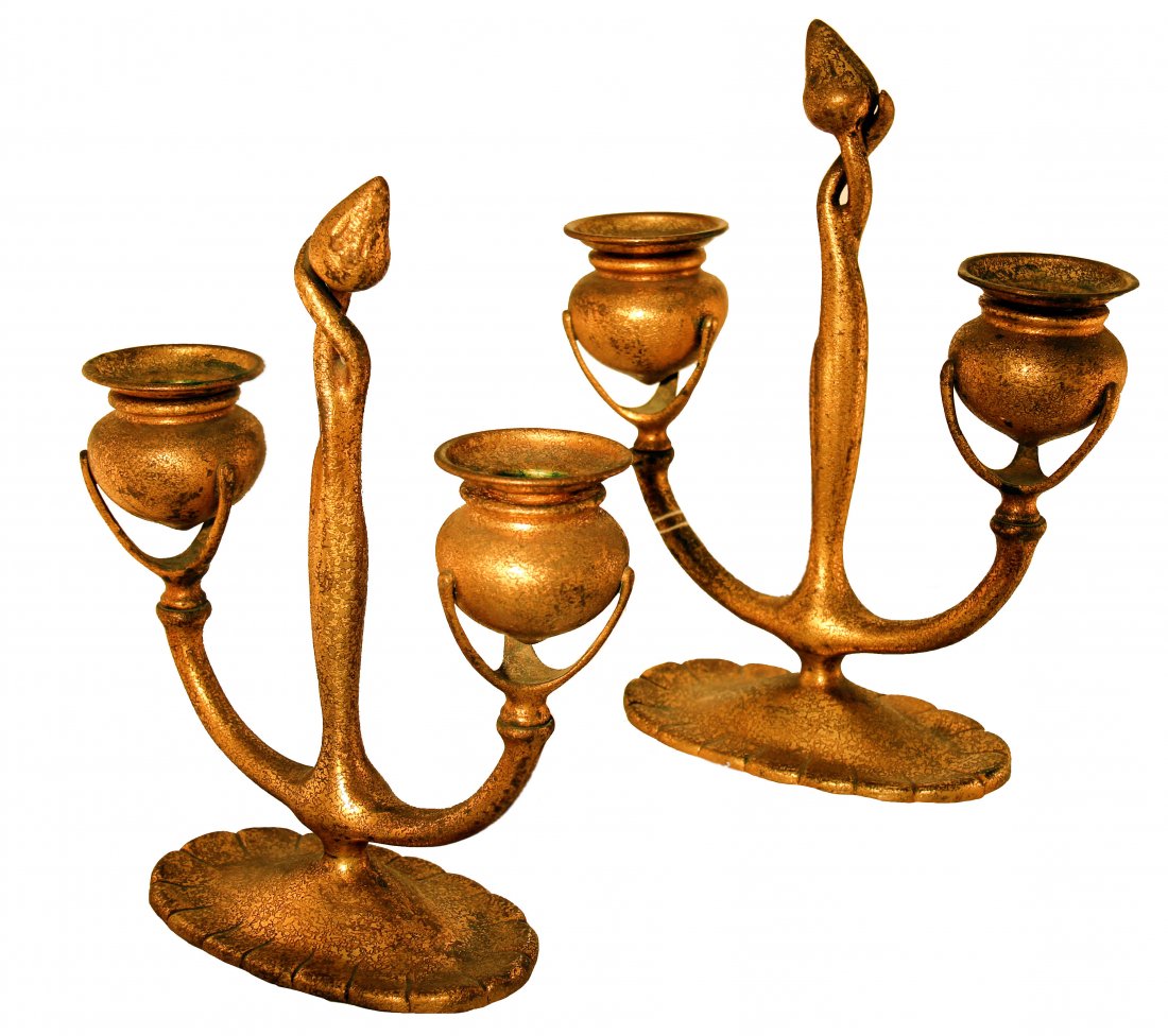 PR TIFFANY STUDIOS GILT BRONZE CANDELABRA, CIRCA 1900: Pair of Tiffany Studios Gilt-Bronze Two-Light Candelabra, of Flori-form with curved branches supporting candle sockets with removable liners, centering a twisted stem ending in a bud, naturalistic dom