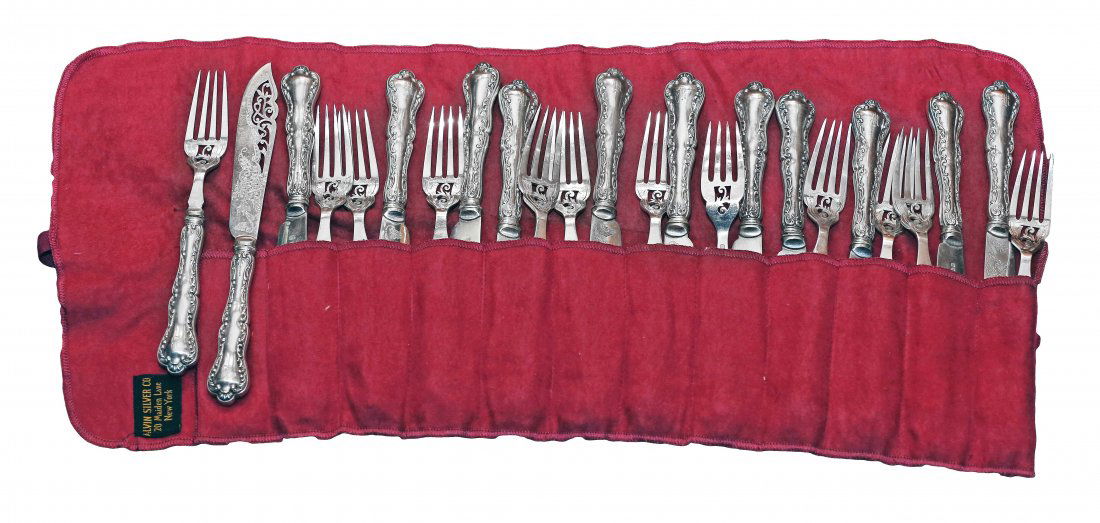 24 PIECE ENGLISH SILVER PLATE AND STERLING SET: PROPERTY OF A MIAMI-DADE COLLECTOR: TWENTY FOUR PIECE ENGLISH SILVER PLATE AND STERLING SILVER FISH SET Circa 1900. Marked Sterling Comprising: 12 fish forks, and 11 fish knives. Each with hollow ster