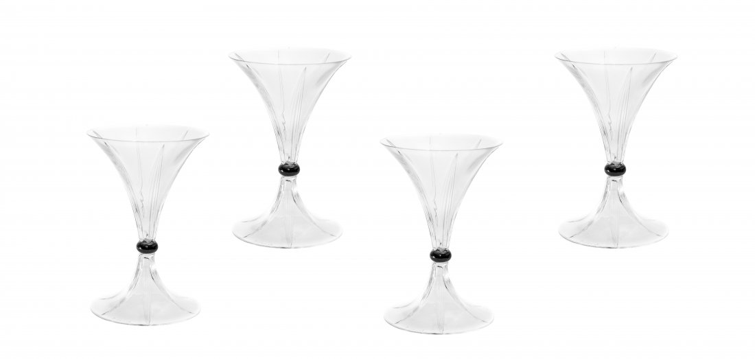 FOUR RENE LALIQUE CLEAR & ENAMEL "SELESTAT" GLASSES: SET OF FOUR RENE LALIQUE CLEAR AND ENAMEL "SELESTAT" CHAMPAGNE GLASSES Circa 1925. Signed R. LALIQUE. Height 5 1/4 inches. Literature: R. Lalique Catalogue Raisonne by Felix Marcilhac, number 5076, pa