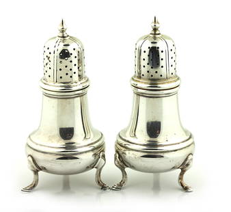 Pair of Tiffany & Co. Sterling Silver Salt/Pepper Casters: Pair of Tiffany & Co. Sterling Silver Salt/Pepper Casters Marked, numbered 451 8 and 451 35. Of typical form, on tripod hooved feet. Xx troy oz. Height 4.5 in.