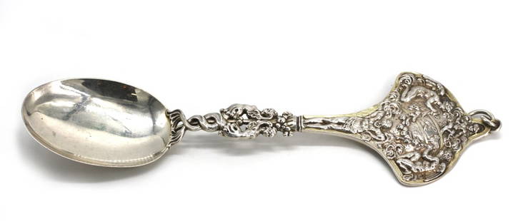 Good Tiffany & Co. Sterling Silver Serving Spoon: Good Tiffany & Co. Sterling Silver Serving Spoon Late 19th Century. Cast in the Renaissance Style with figural elements and festive garlands, the reverse with incised foliage, xx troy oz. Length 12 in