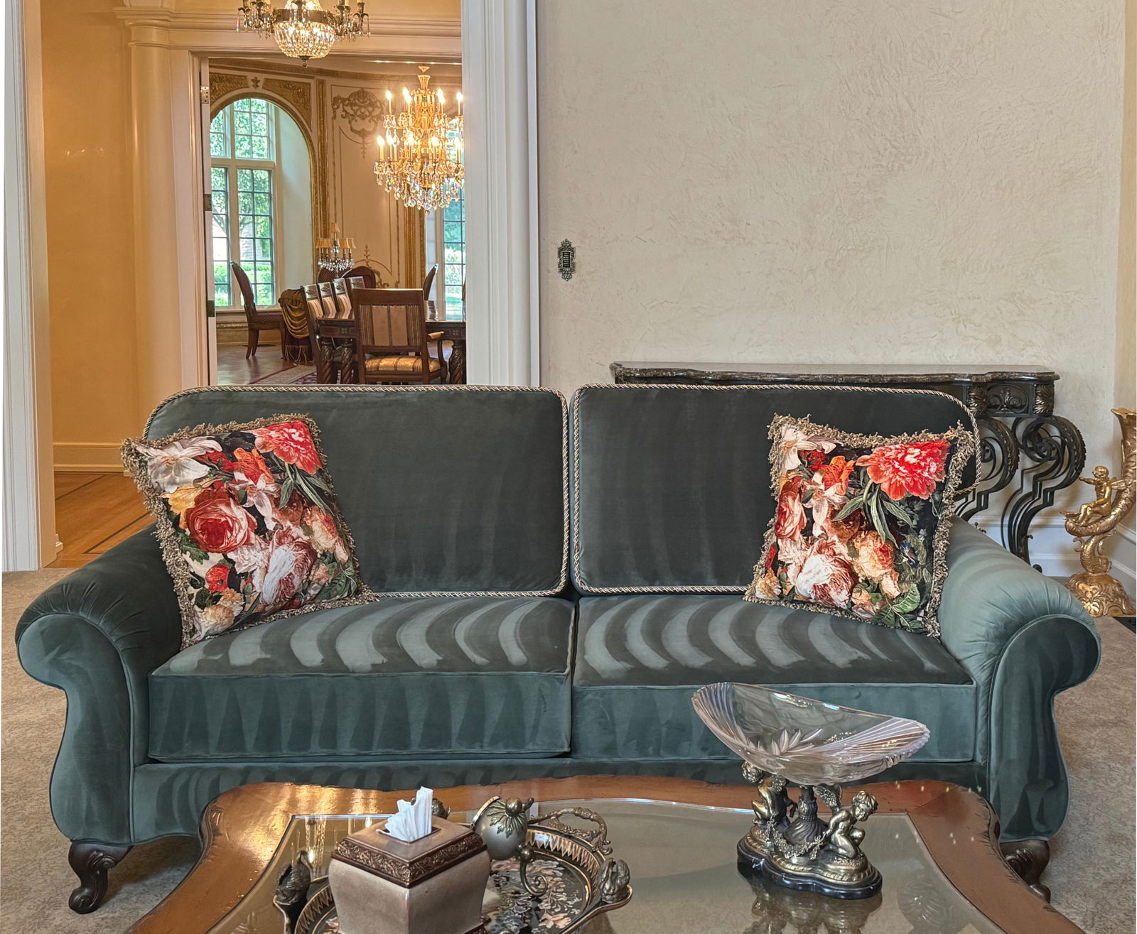 Pair of Large Green Velvet Upholstered Old World Settees: Pair of Large Green Velvet/Valour Upholstered Old World Settees Each with loose cushions, and scrolled arms, defined by cable-twist piping, on short scrolled wooden feet. Height 34 in., Width 85 in.,