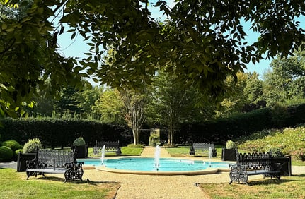 Pair of Cast Iron Double-Sided Garden Settees