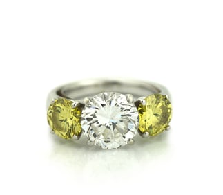 Platinum, Yellow Diamond and Diamond Three Stone Engagement Ring