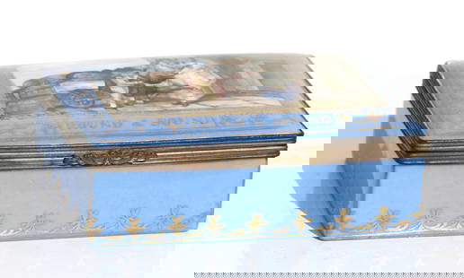 English Parcel Gilt and Painted Porcelain Box: English Parcel Gilt and Painted Porcelain Box, Mid to late 19th Century. The rectangular hinged cover painted with a figural panel and inscribed, Round and Sound . . Length 5 in. (12.7 cm.)
