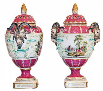 Pair of Berlin Neoclassical Porcelain Covered Urns: Pair of Berlin Porcelain Covered Urns 19th Century, the undersides with a scepter in under-glaze blue. Each in a Neoclassical style with rams heads and molded ribbon-entwined branches, Each side with