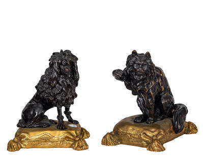 Pair of Louis XVI Style Gilt and Patinated Bronze Chenets: Pair of Louis XVI Style Gilt and Patinated Bronze Chenets. After a model by Caffiéri, cast with a dog and cat respectively, each seated upon a cushion. Height 10.5 in. (26.67 cm.), Width 8.75 in.