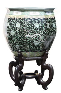 Large Chinese Famille-Noire Foliate Decorated Jardiniere: Large Chinese Famille-Noire Foliate Decorated Jardiniere Of hexagonal shape, supported on a splayed foot, well painted in brilliant tones of black, yellow and green. Height 18.5 in. (46.99 cm.)