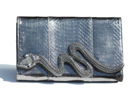 Judith Lieber Collectors Limited Ed. Snake Skin Minaudiere Bag: Judith Lieber Collectors Limited Ed. Snake Skin Bag The rectangular black snake skin bag with a black finished metal snake with minaudiere beads, with a gray faux suede interior lining, black