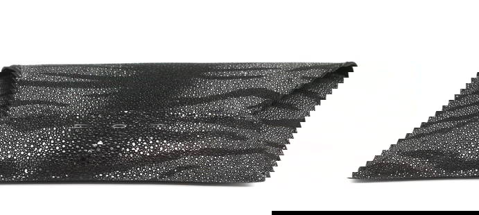 Manila Stingray Platinum Tiger Striated Clutch: Manila Stingray Platinum Tiger Striated Clutch First edition, 182/300, V B H. The shaped rectangular body with a silver and black striated body, with a single flap and short exterior pocket, the