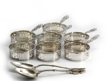 Seven Shreve & Co. Sterling Silver Ramekin Holders: Seven Shreve & Co. Sterling Silver Ramekin Holders. Together with a Pair of Sterling Serving Spoons. The ramekins marked, circular with pierced sides and handles, the spoons, marked sterling, with han