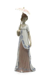 Lladro Porcelain Figure of a Young Woman with Parasol: Lladro Porcelain Figure of a Young Woman with Parasol Marked, the elegantly dressed with a pink parasol. Height 11 in.