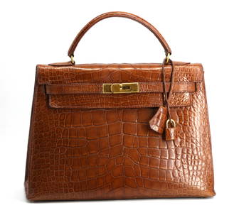 Hermès Birkin 32cm Matte Miele Waxed Porosus Alligator with Gold Toned Hardware – 1999: Hermès Birkin 32cm Matte Miele Waxed Porosus Alligator with Polished Gold Hardware – 1999 A rare and highly sought-after Hermès Birkin 32cm, expertly crafted in matte Miele waxed Porosus