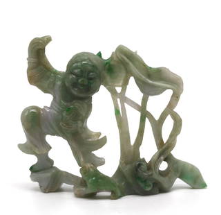 Chinese Jadeite Group of a Boy in a Marsh: Chinese Jadeite Group of a Boy in a Marsh The pale green jade with emerald green inclusions and lavender hues depicting a boy frolicking amidst water plants, a frog at his feet. Height 3 in.,