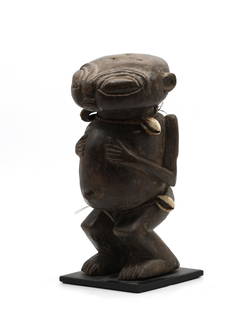 Pygmy Wood and Cowrie Shell Fertility Figure: Pygmy Wood and Cowrie Shell Fertility Figure Southern Africa, 20th Century. Height 5.25 in., Width 3.75 in., Depth 4 in. Provenance: Formerly the Property of Lynn University, Boca Raton, FL 