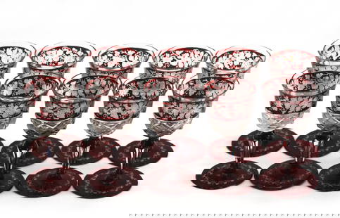 Set of Ten Bohemian Ruby Flashed Cut Glass Cordials: Set of Ten Bohemian Ruby Flashed Cut Glass Cordials Early 20th Century. Each bell-shaped bowl cut with diamond motifs and etched with grape clusters and leaves, on faceted stems with a circular