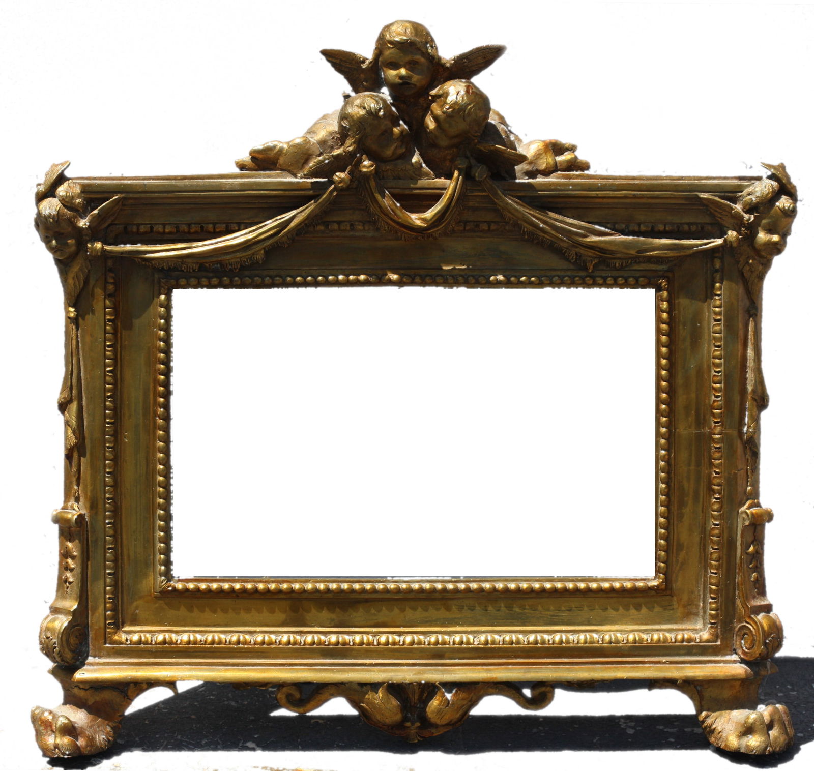 Good Renaissance Style Bronze Frame: Good Renaissance Style Bronze Frame Possibly American, 1880-1920. The heavily cast rectangular frame with a double bead border, with a cresting of three winged putto and drapery swags, the canted side