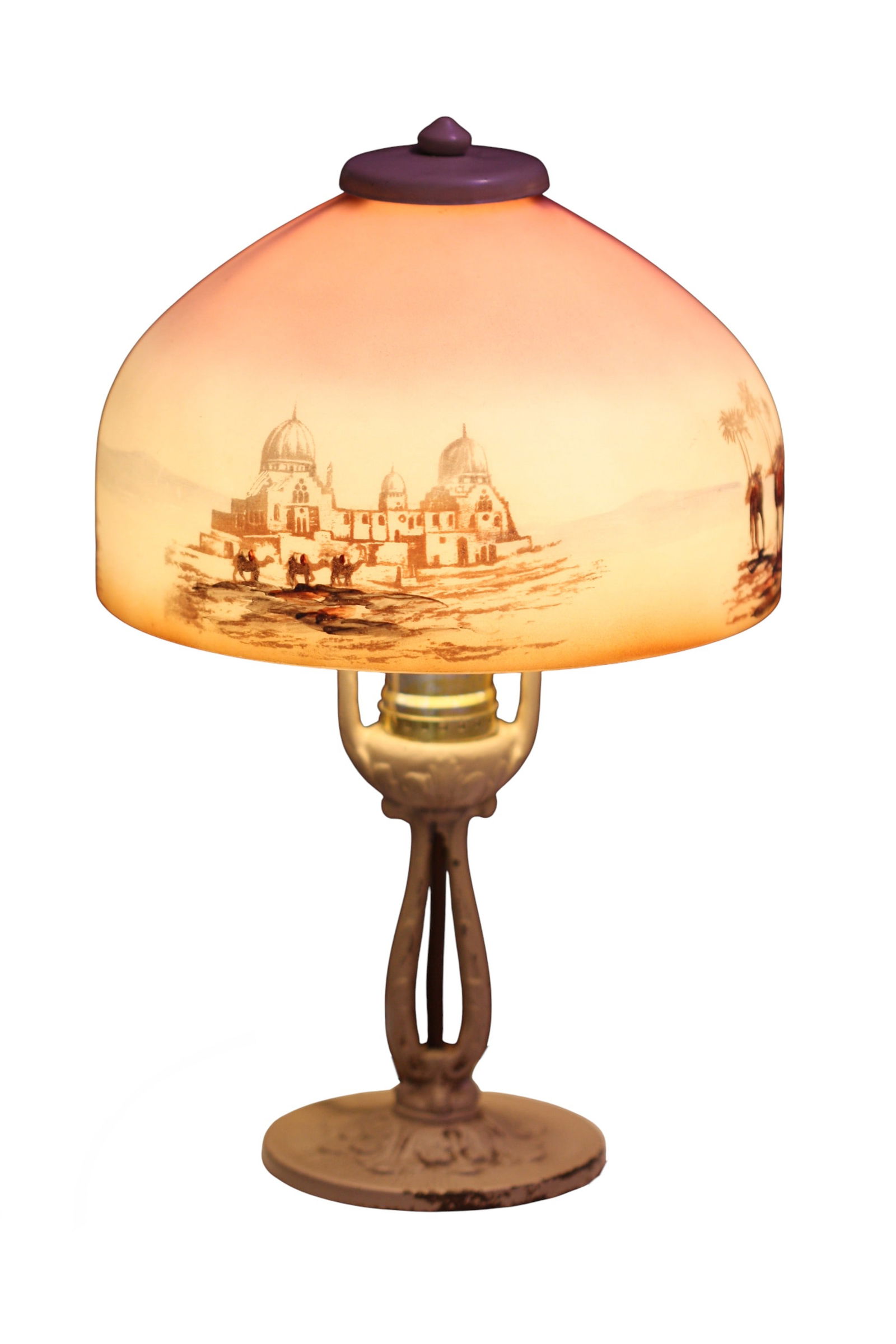 Mt. Washington Burmese Glass Desk Lamp: Mt. Washington Burmese Glass Desk Lamp Circa 1890, the pink and white dome shade hand painted with Middle Eastern Desert vignettes containing mosques, palm trees and camels, on a cream painted metal b
