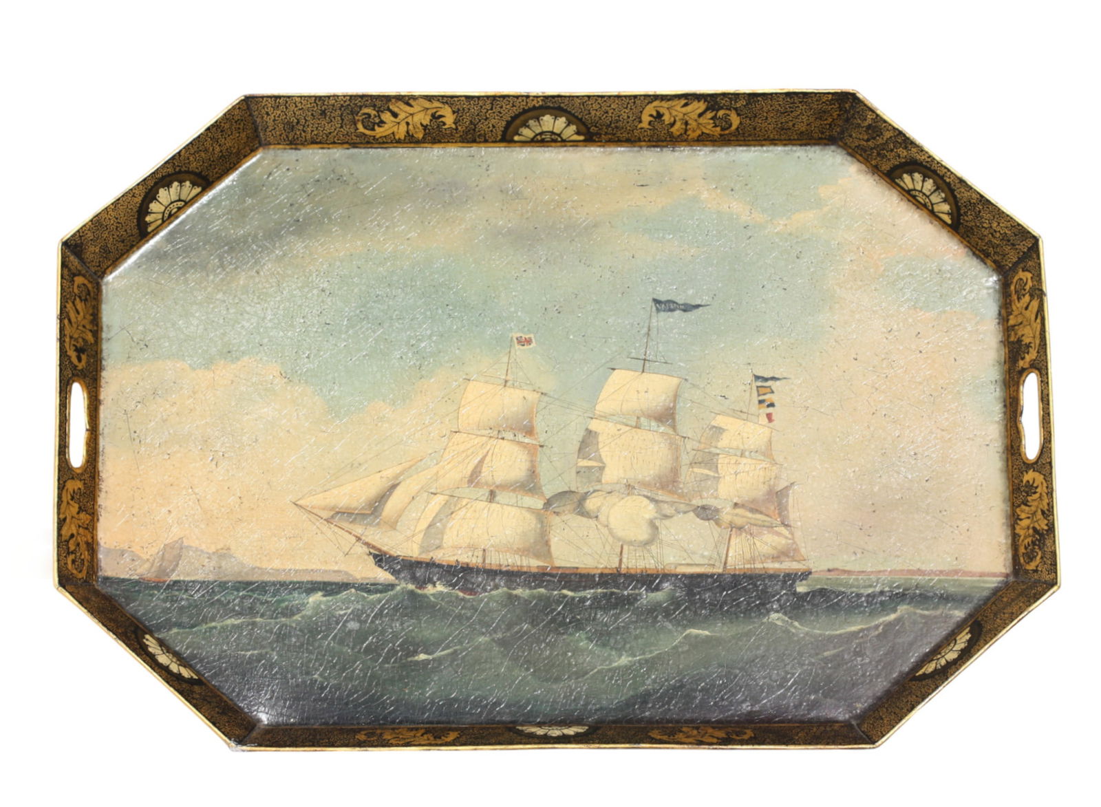 English Regency Painted & Parcel Gilt Tole Tray: English Regency Painted & Parcel Gilt Tole Tray Circa 1820. Rectangular with canted corners and hand-holds, decorated with a British clipper ship at sea, the gallery with gilt leaves and fan motifs. H