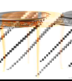 Mahogany Gueridon Table, in the Louis XV Style: Mahogany Gueridon Table, in the Louis XV Style Circa 1880. Applied with gilt bronze mounts, the radiating veneered top above a frieze applied with satyrs engaged in Bacchanalian revelry and containing