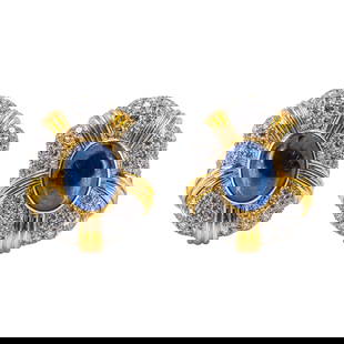 Pair of 18 Karat Gold, Sapphire, and Diamond Ear Clips: Pair of 18 Karat Gold, Sapphire, and Diamond Ear Clips Each centering an oval cabochon sapphire together weighing approximately 14–16 carats, within a dome-shaped mount pavé-set with approximately