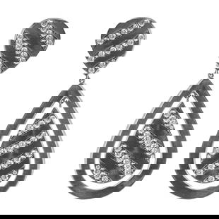 Sabbadini, Pair of 18 Karat White Gold and Diamond Earrings: Sabbadini, Pair of 18 Karat White Gold and Diamond Earrings Italy, late 20th century Each earring designed as a stylized open teardrop with an inner panel of alternating polished and diamond-set