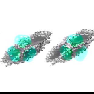 Andreoli Pair of 18K White Gold, Emerald, and Diamond Ear Clips: Andreoli Pair of 18K White Gold, Emerald, and Diamond Ear ClipsSigned Andreoli Of floral cluster design, set with carved cabochon emeralds of vivid green color, accented by pavé-set brilliant-cut