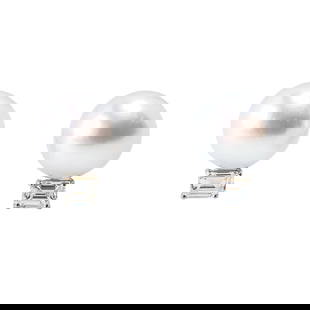 Pair of Platinum, South Sea Pearl and Diamond Ear Clips: Pair of Platinum, 18K Gold, South Sea Pearl and Diamond Ear Clips Each centering a fine South Sea pearl measuring approximately 15.8 mm, mounted in platinum, accented by a step-cut diamond set in 18